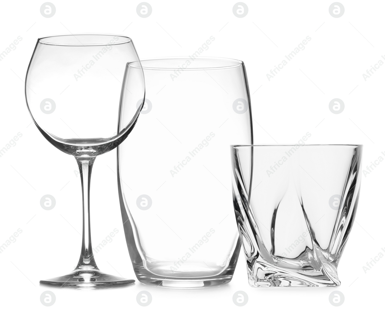 Image of Set of empty glasses on white background