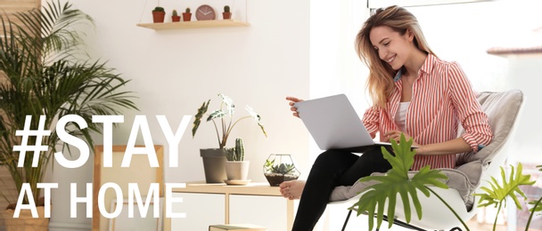 Image of Hashtag Stay At Home - protective measure during coronavirus pandemic, banner design. Young woman working with laptop in living room