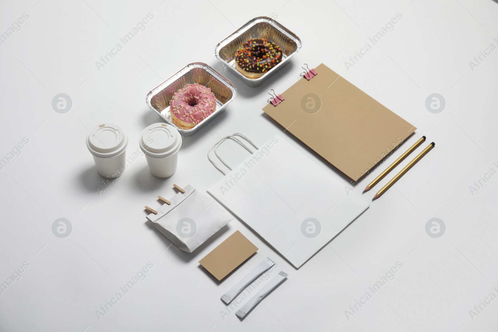 Photo of Composition with items for mock up design on light background. Food delivery service