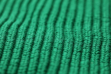 Photo of Texture of soft green fabric as background, closeup