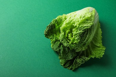Photo of Fresh ripe Chinese cabbage on green background