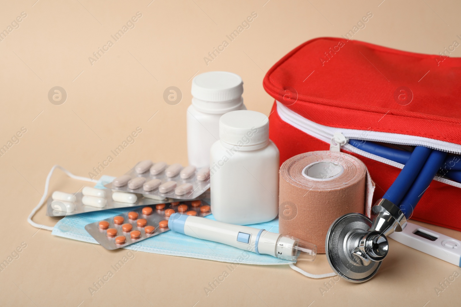 Photo of First aid kit on color background. Health care