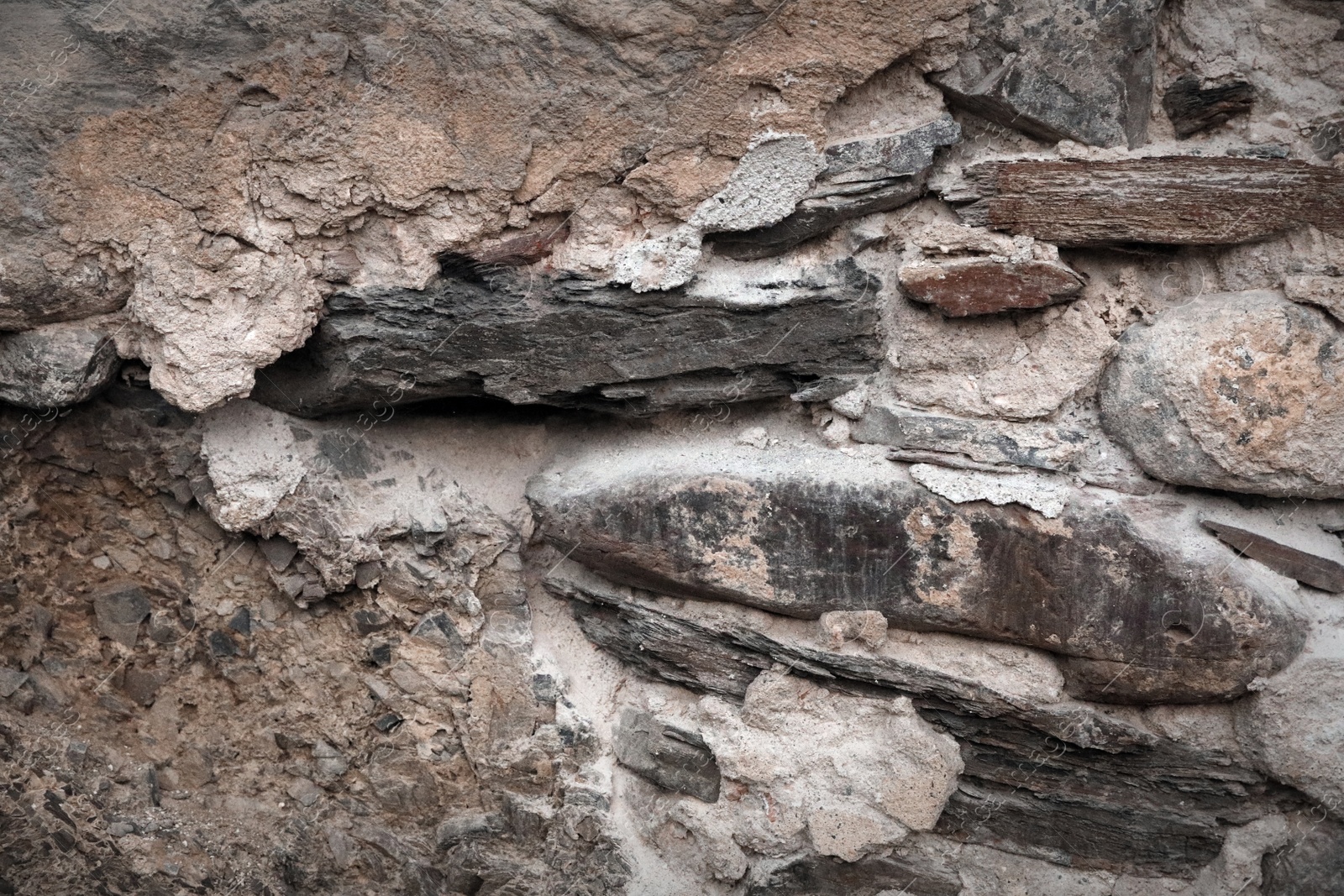 Photo of Texture of old stone surface as background, closeup