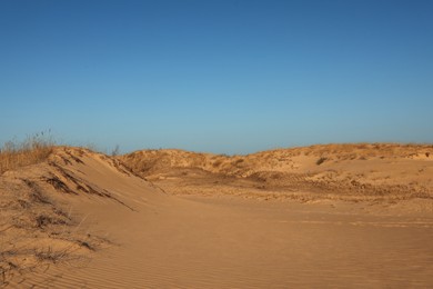 Photo of Picturesque view of desert on sunny day
