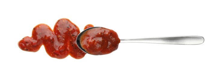 Tomato sauce and spoon isolated on white, top view