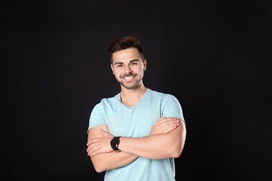 Photo of Portrait of handsome man on black background