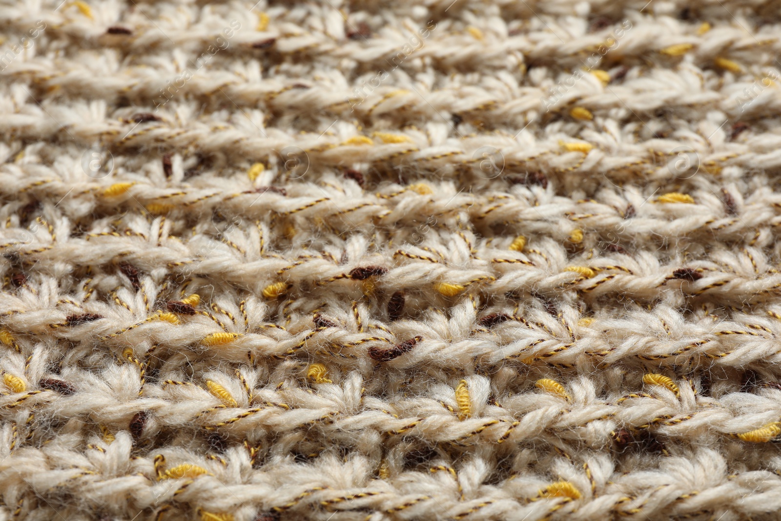 Photo of Texture of knitted fabric as background, closeup