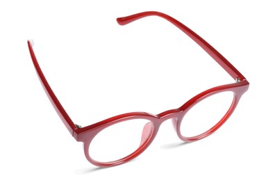 Photo of Stylish glasses with red frame isolated on white