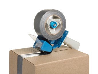 Dispenser with roll of adhesive tape on box against white background