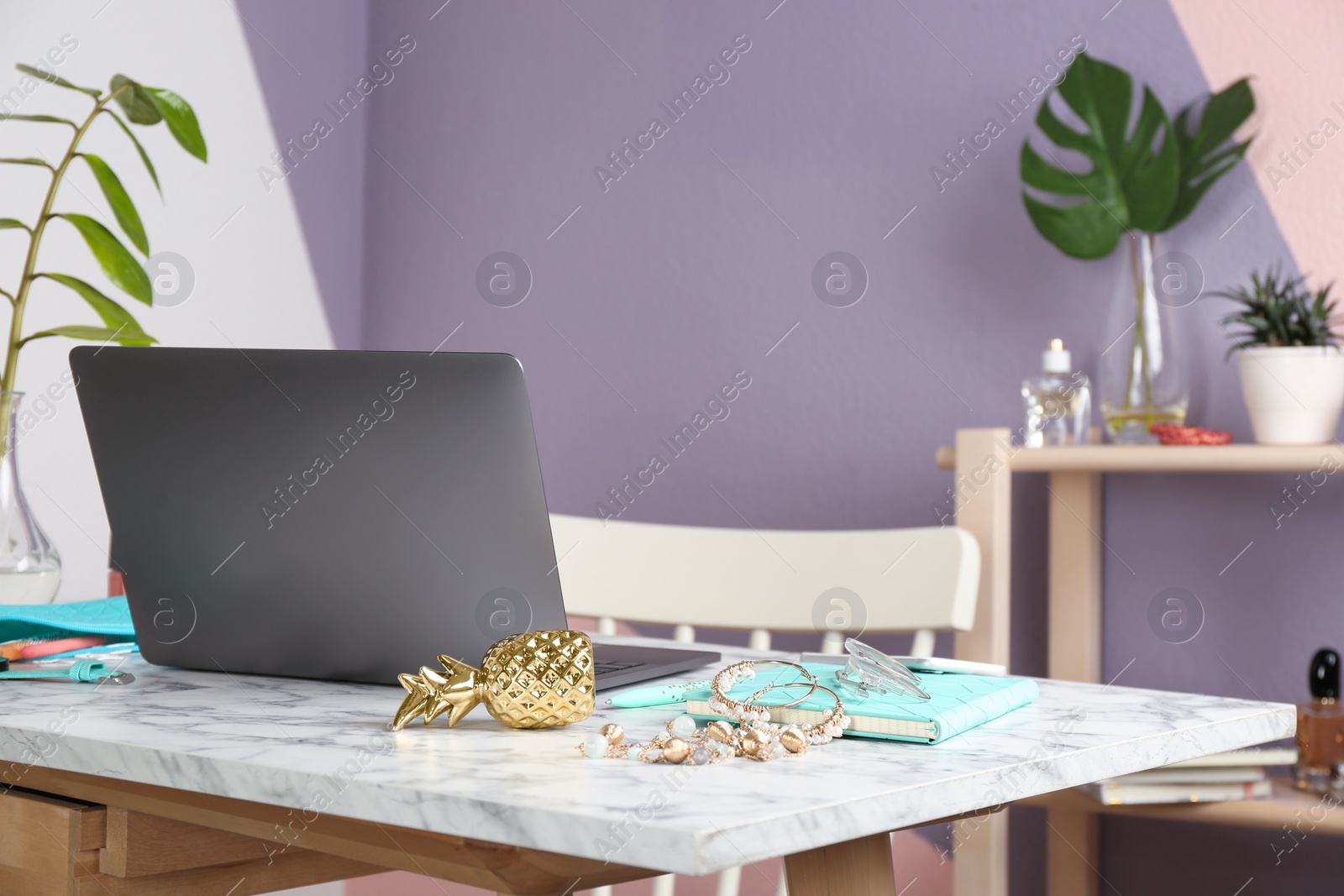 Photo of Modern workplace with laptop on table indoors, space for text. Professional blogger