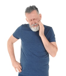 Photo of Man suffering from toothache on white background