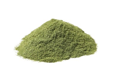 Pile of wheat grass powder isolated on white