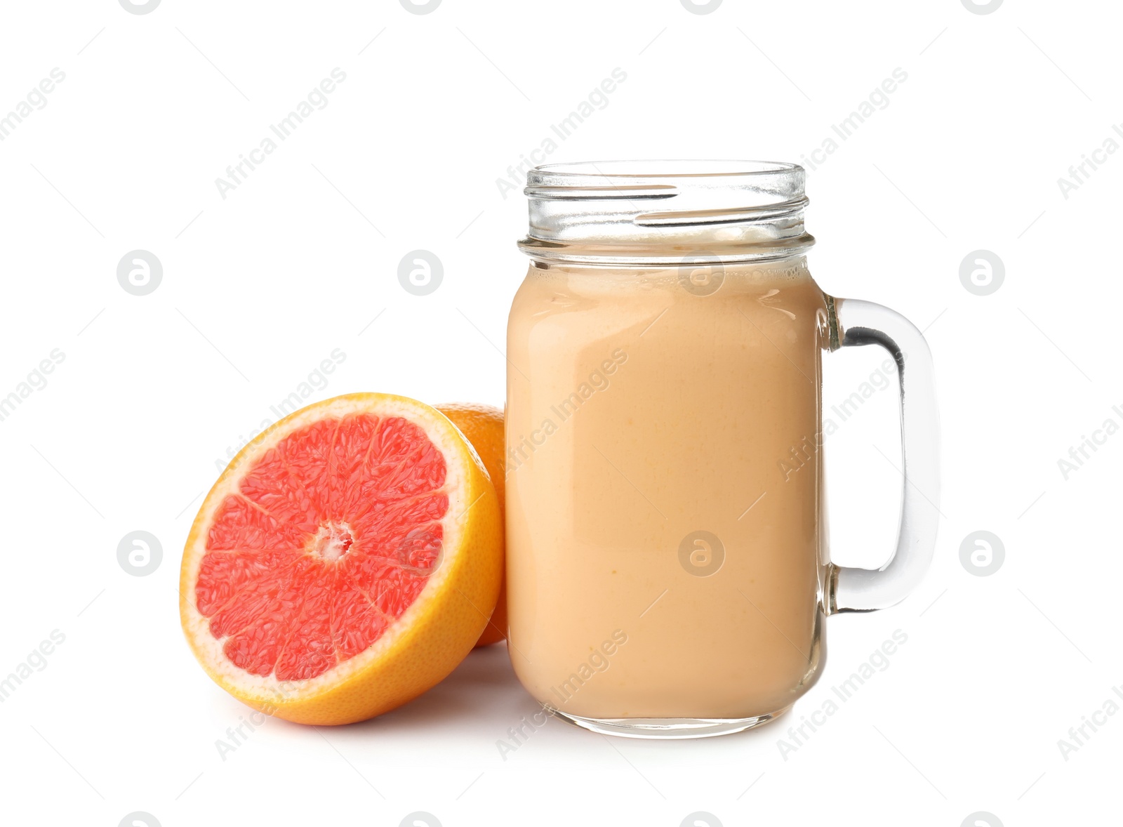 Photo of Mason jar with healthy detox smoothie and grapefruit on white background