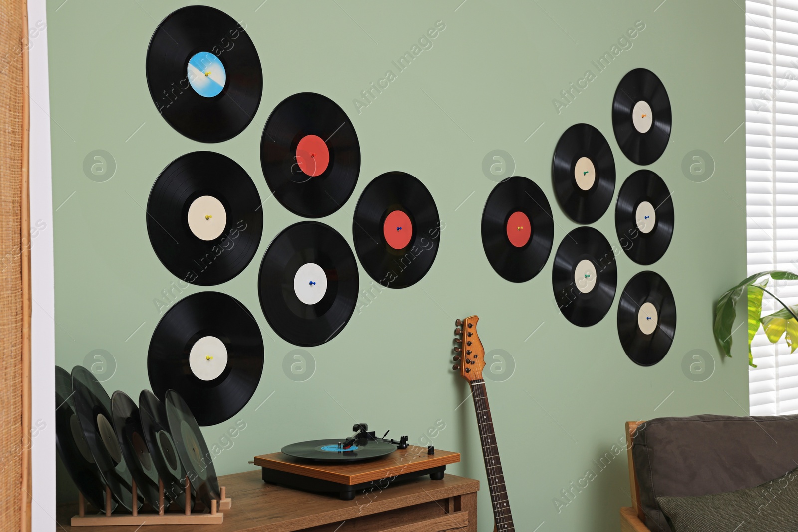 Photo of Living room interior decorated with vinyl records