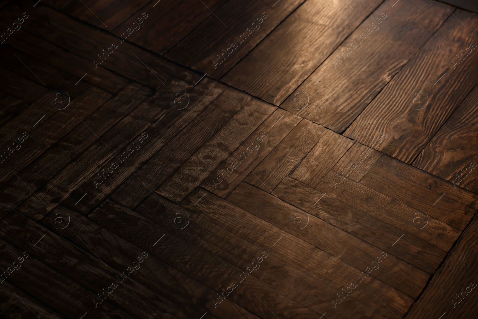 Photo of Wooden parquet floor as background, closeup view