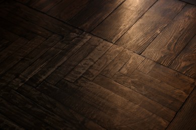 Photo of Wooden parquet floor as background, closeup view