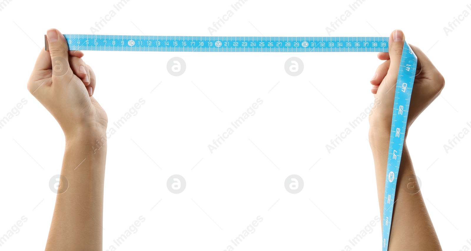 Photo of Woman holding light blue measuring tape on white background, closeup