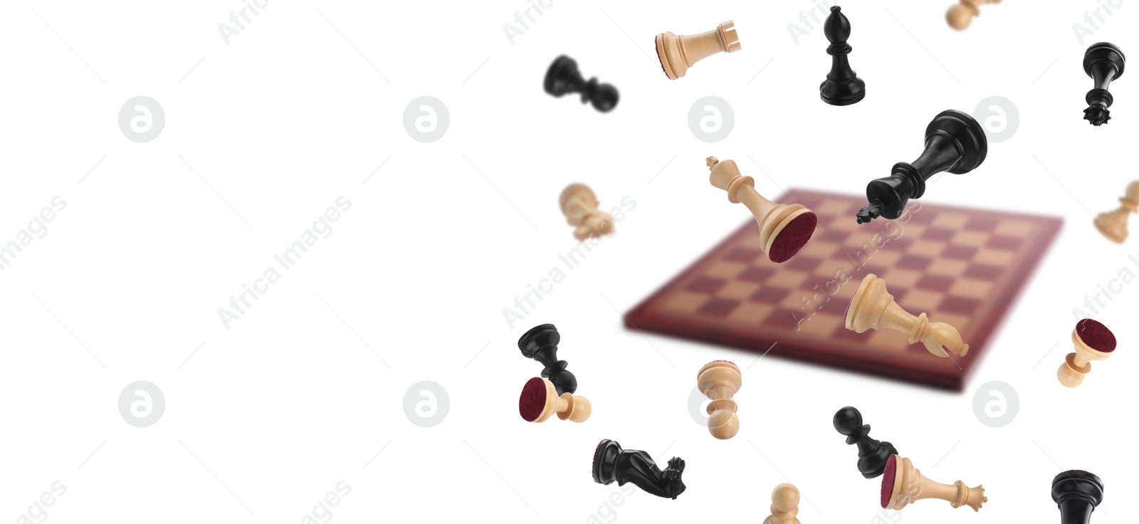 Image of Chess pieces and wooden checkerboard falling on white background