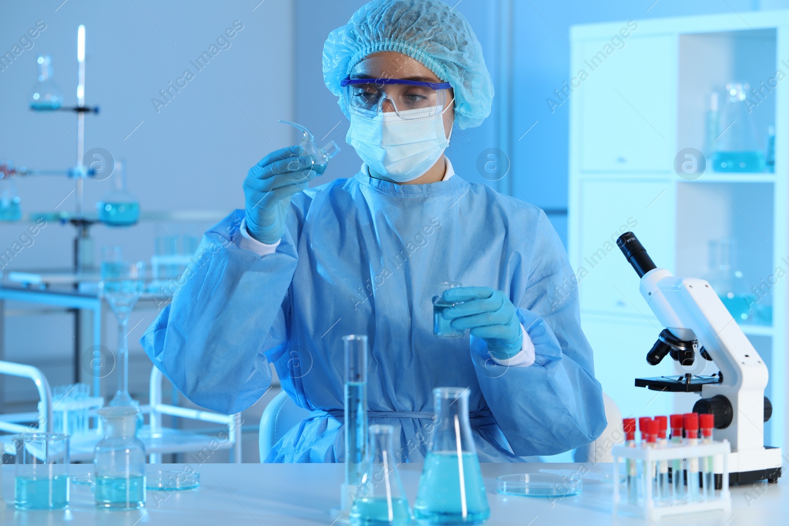 Photo of Scientist working with samples in laboratory. Medical research