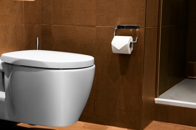 Beautiful bathroom with stylish toilet bowl in luxury hotel. Interior design