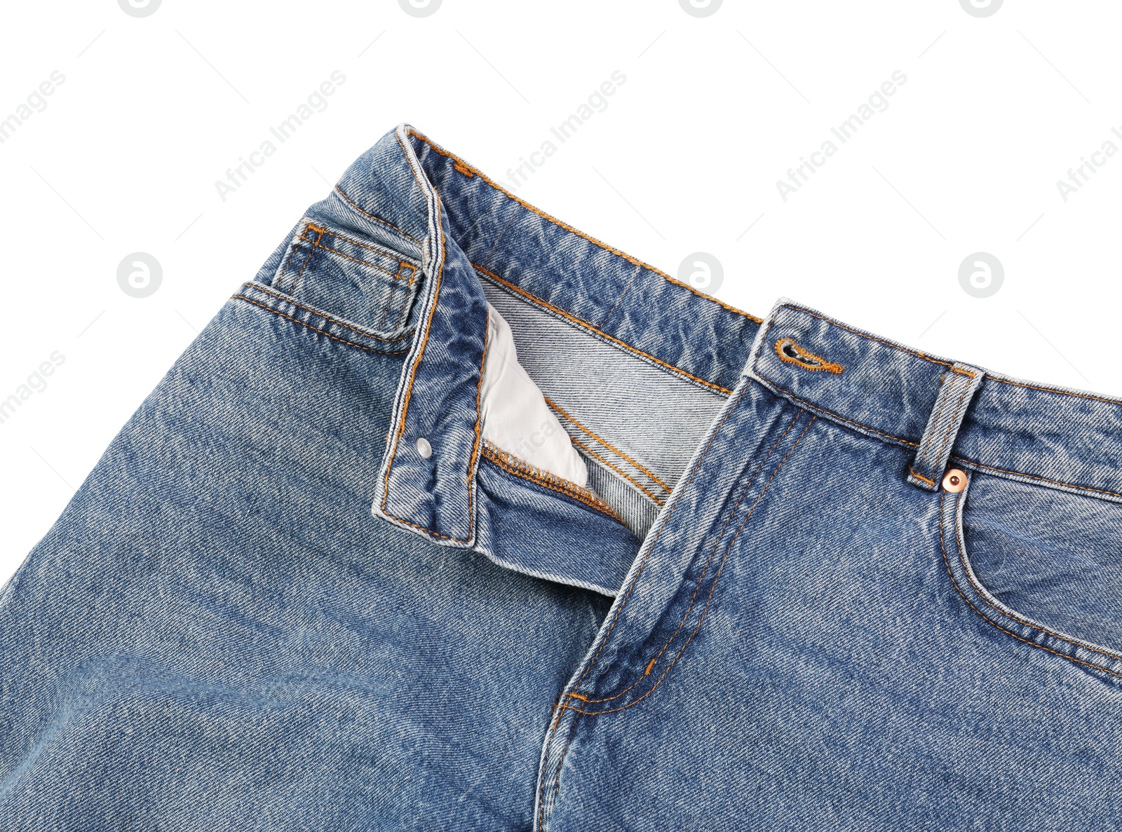 Photo of Stylish blue jeans isolated on white, top view
