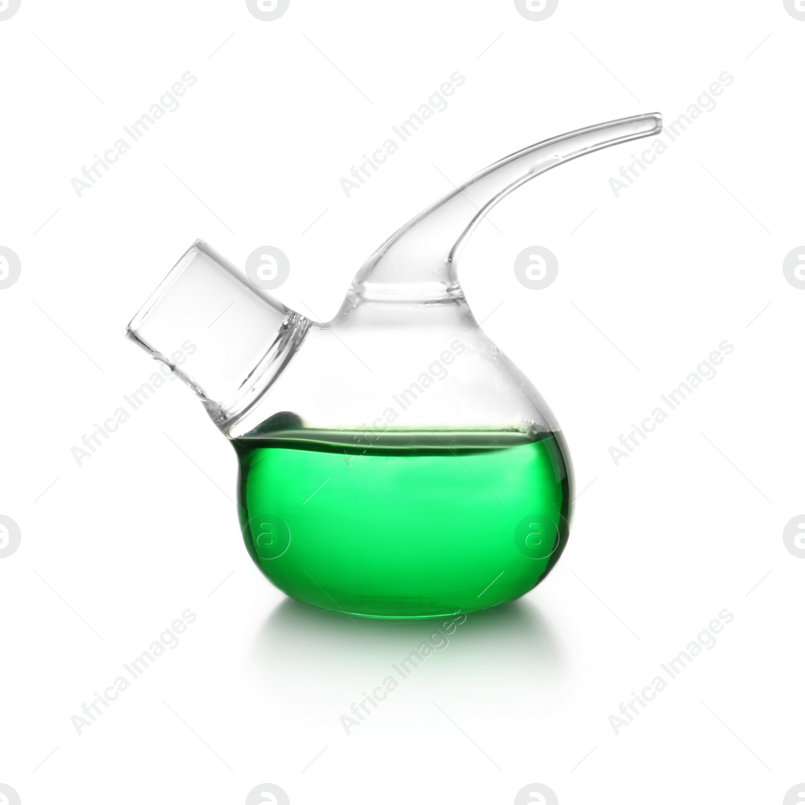 Photo of Retort flask with green liquid on white background