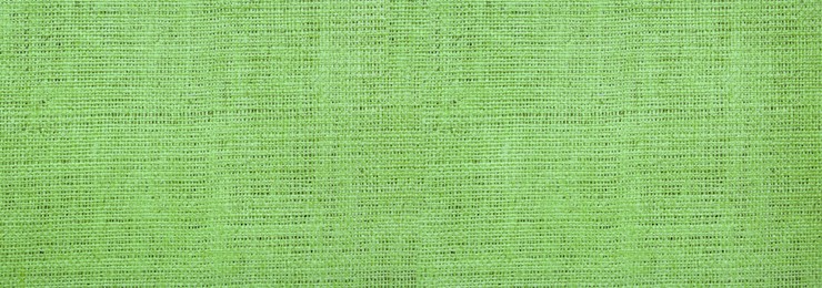 Image of Texture of green burlap fabric as background, top view. Banner design