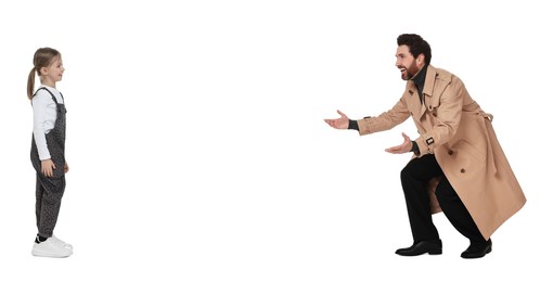 Father reaching for his daughter on white background