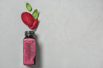 Photo of Flat lay composition with beet smoothie on light background with space for text