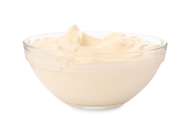 Photo of Tasty mayonnaise in glass bowl isolated on white
