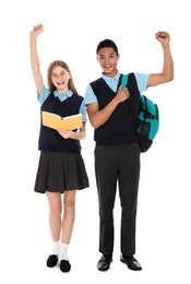 Full length portrait of teenagers in school uniform on white background