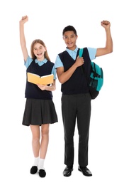 Photo of Full length portrait of teenagers in school uniform on white background