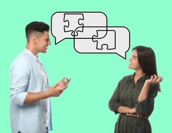 Image of Man and woman talking on mint color background. Dialogue illustration. Speech bubbles with puzzle pieces