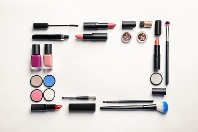 Photo of Flat lay composition with decorative cosmetics on white background