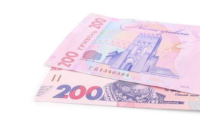 Photo of 200 Ukrainian Hryvnia banknotes on white background