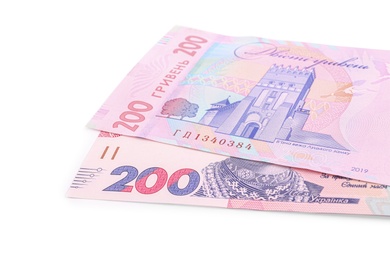 200 Ukrainian Hryvnia banknotes on white background