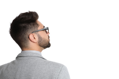 Photo of Young businessman in suit on white background