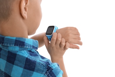 Boy with stylish smart watch on white background, closeup