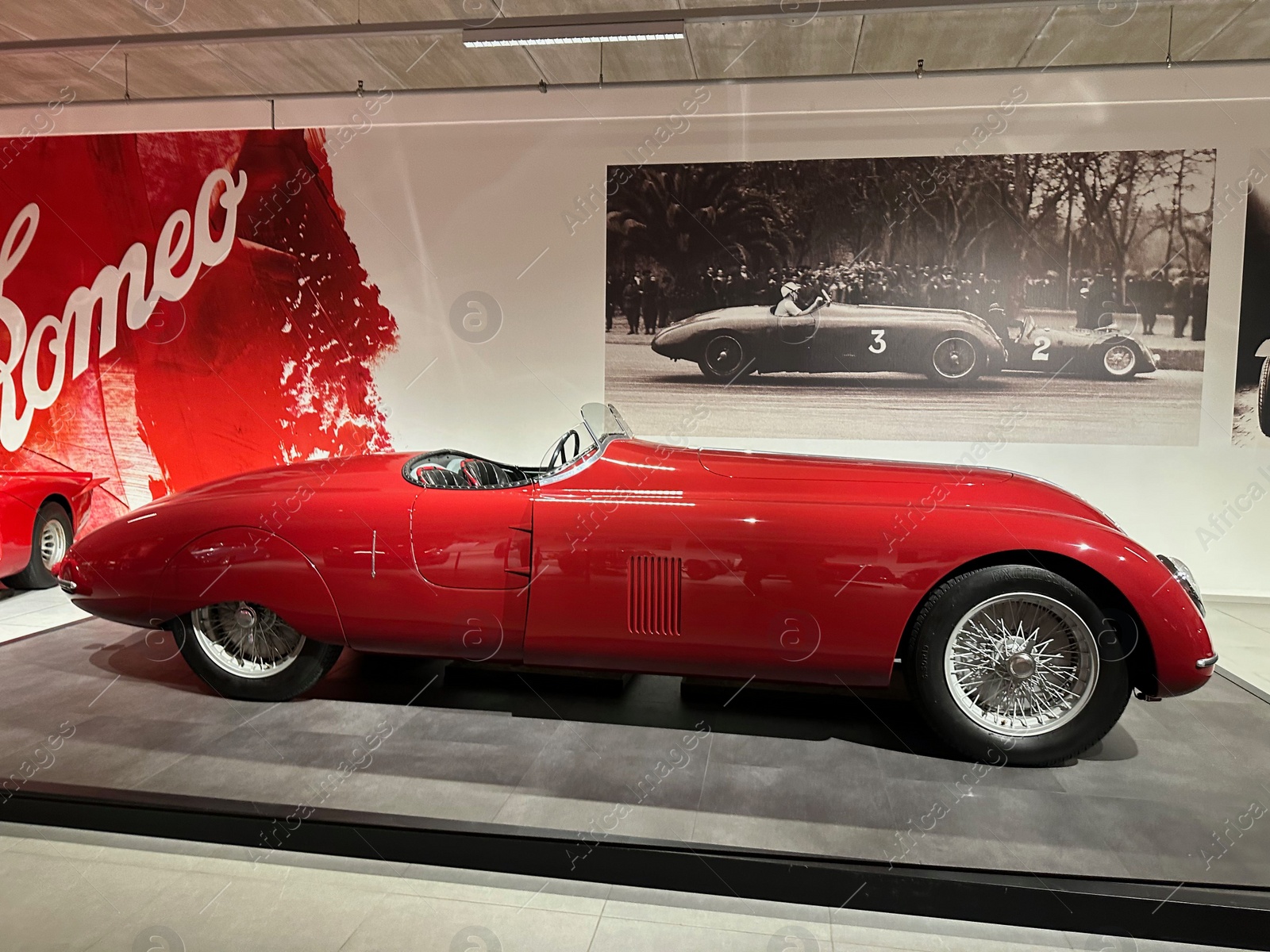 Photo of Hague, Netherlands - November 8, 2022: Beautiful view of red retro car in Louwman museum