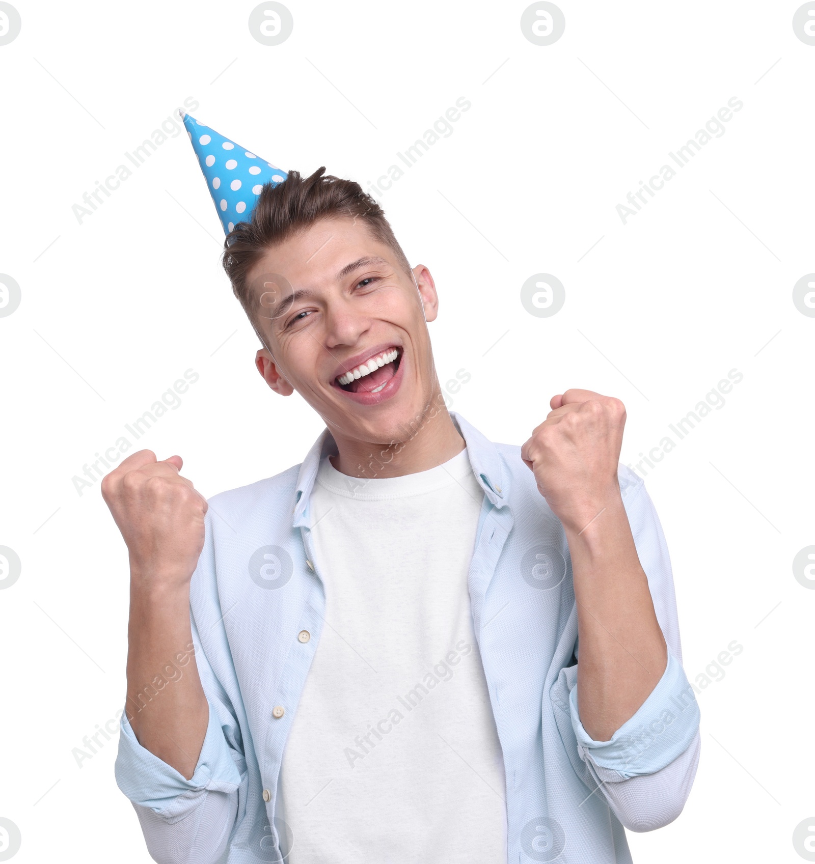 Photo of Happy young man in party hat on white background