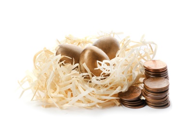 Photo of Nest with golden eggs and coins on white background. Pension concept