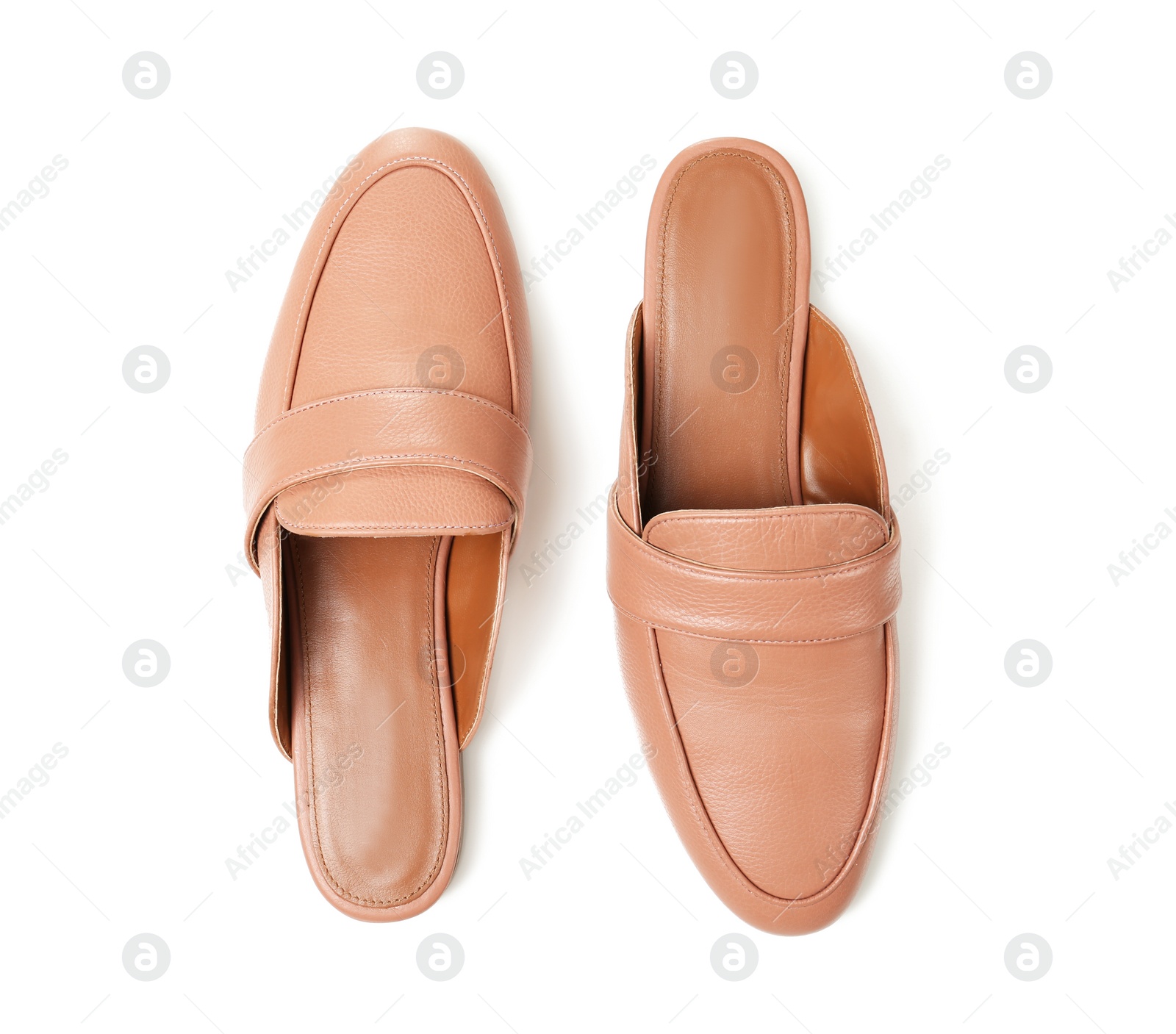 Photo of Pair of female shoes on white background, top view