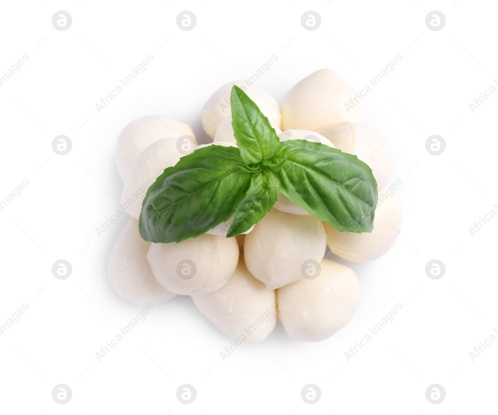 Photo of Tasty mozzarella balls and basil leaves isolated on white, top view