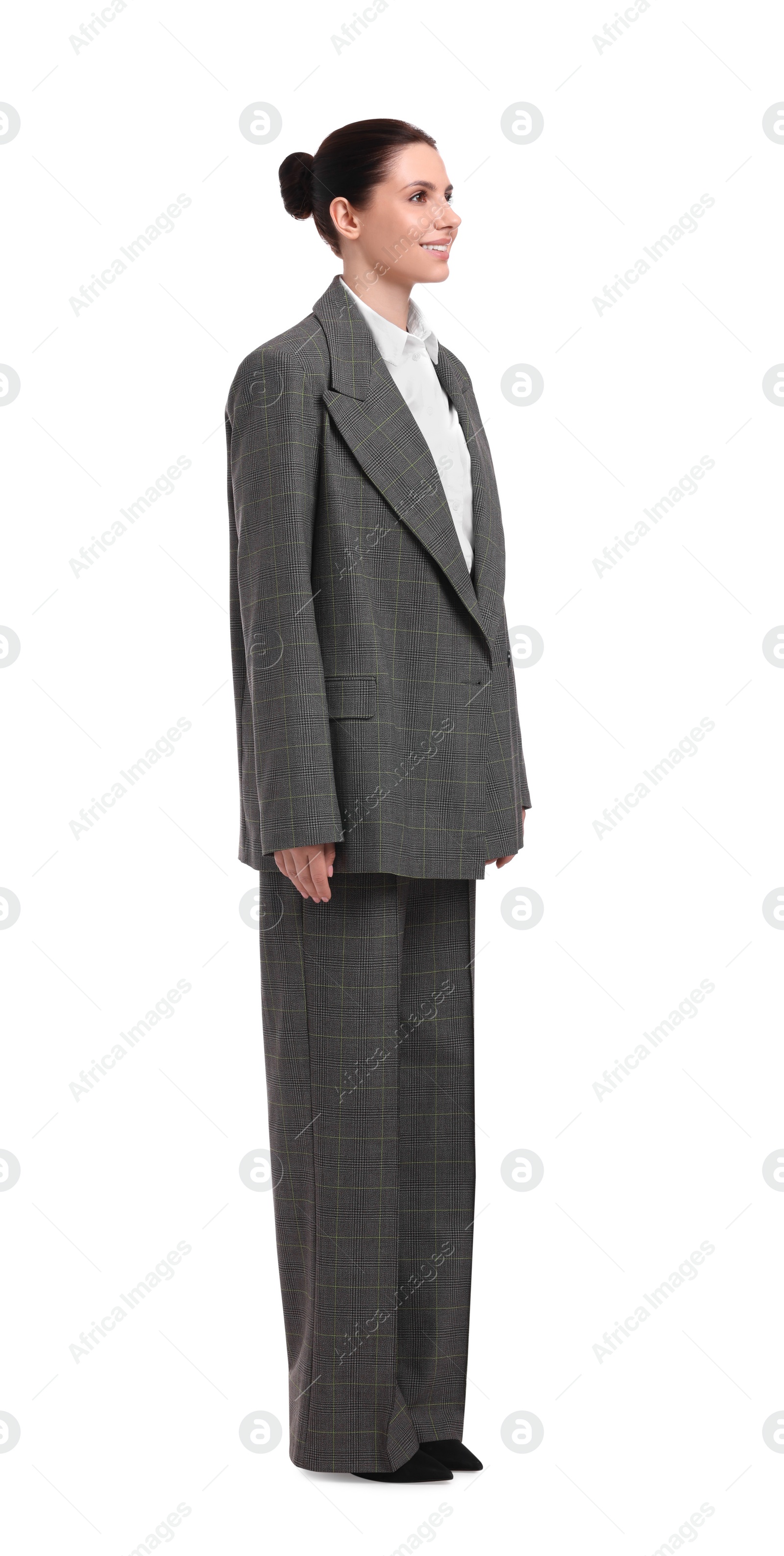 Photo of Beautiful young businesswoman in suit on white background