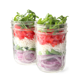 Photo of Healthy salad in glass jars isolated on white