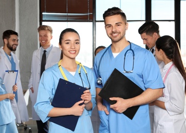 Photo of Portrait of medical workers indoors. Unity concept