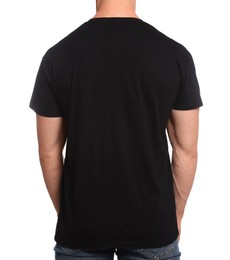 Photo of Man wearing black t-shirt on white background, back view. Mockup for design