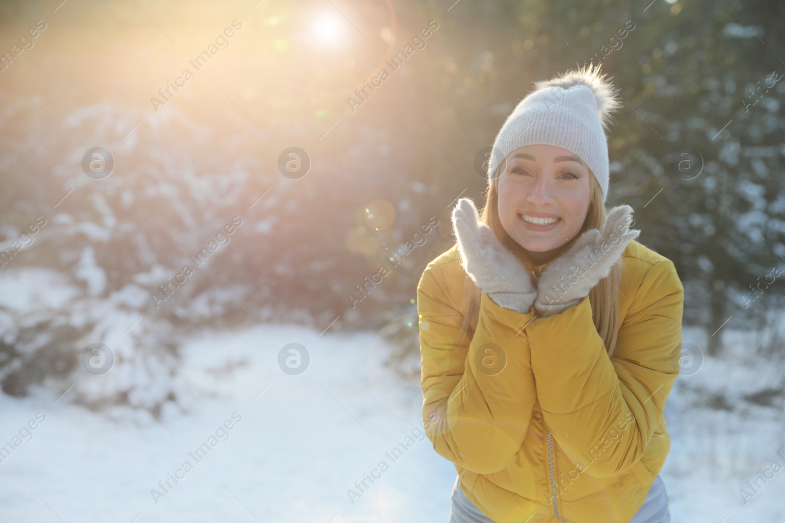 Photo of Woman enjoying winter day in forest, space for text