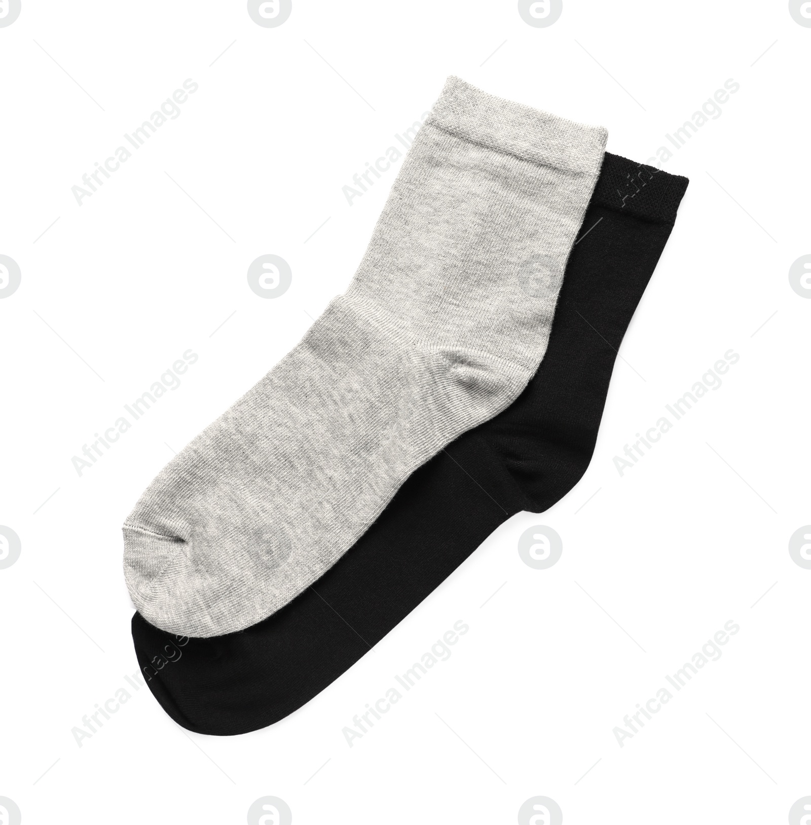 Photo of Different socks isolated on white, top view