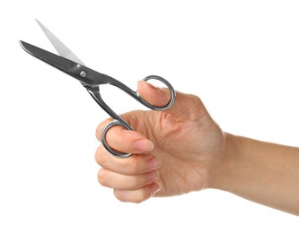 Photo of Woman holding sewing scissors isolated on white, closeup